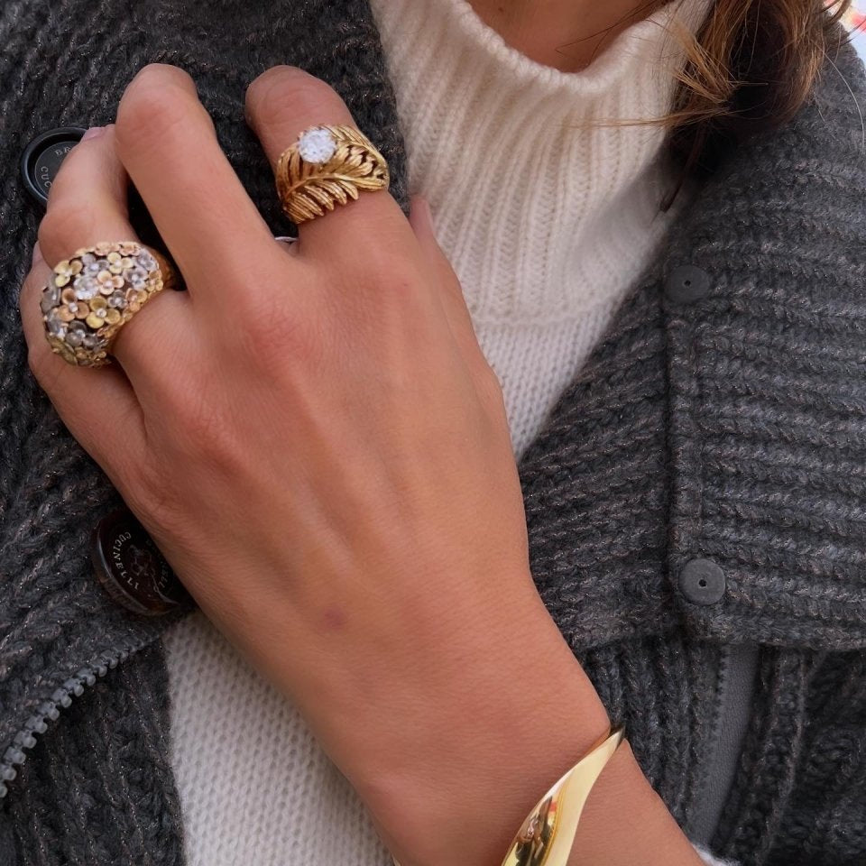 Bague en or jaune en forme de plume ornée d'un solitaire - Castafiore