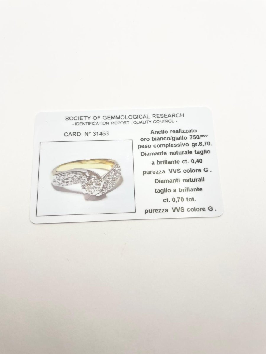 Bague en or jaune et or blanc avec diamant - Castafiore