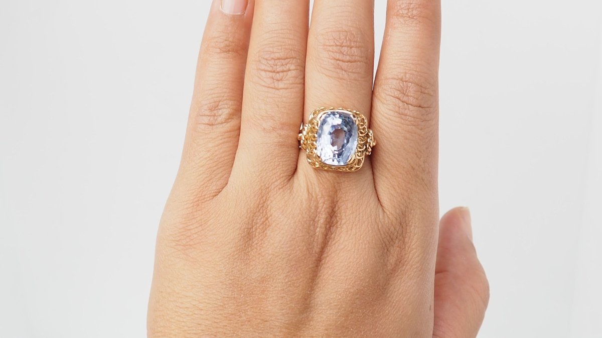Bague en or jaune et Topaze bleue - Castafiore