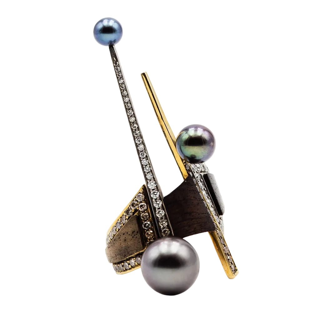 Bague en or jaune, or blanc, perles, essences boisées et diamants - Castafiore