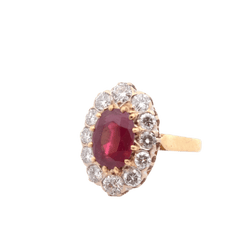 Bague en or jaune, platine, rubis et diamants - Castafiore