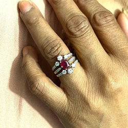 Bague en or jaune, platine, rubis et diamants - Castafiore