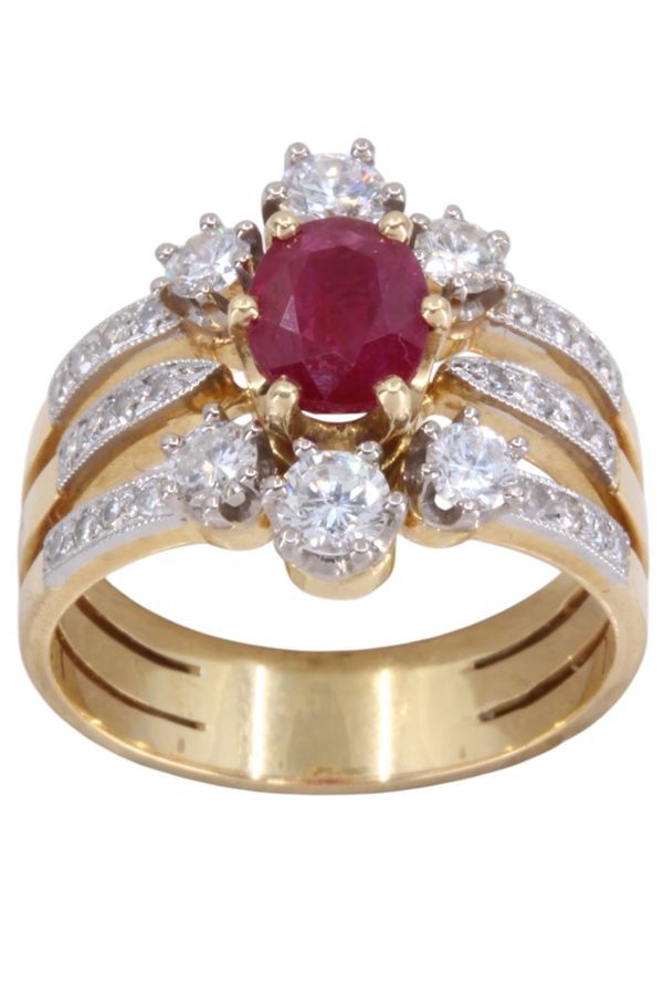 Bague en or jaune, platine, rubis et diamants - Castafiore