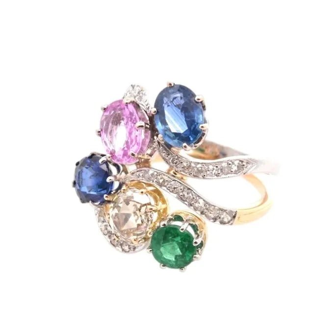 Bague en or jaune, platine, saphirs, émeraude et diamants - Castafiore