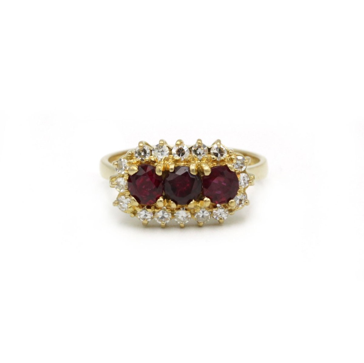 Bague en or jaune, rubis et diamants - Castafiore