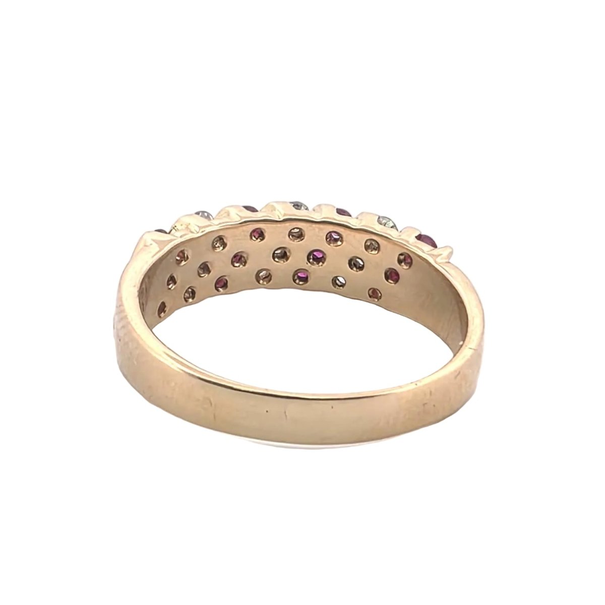 Bague en or jaune, rubis et diamants - Castafiore