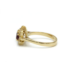Bague en or jaune, rubis et diamants - Castafiore
