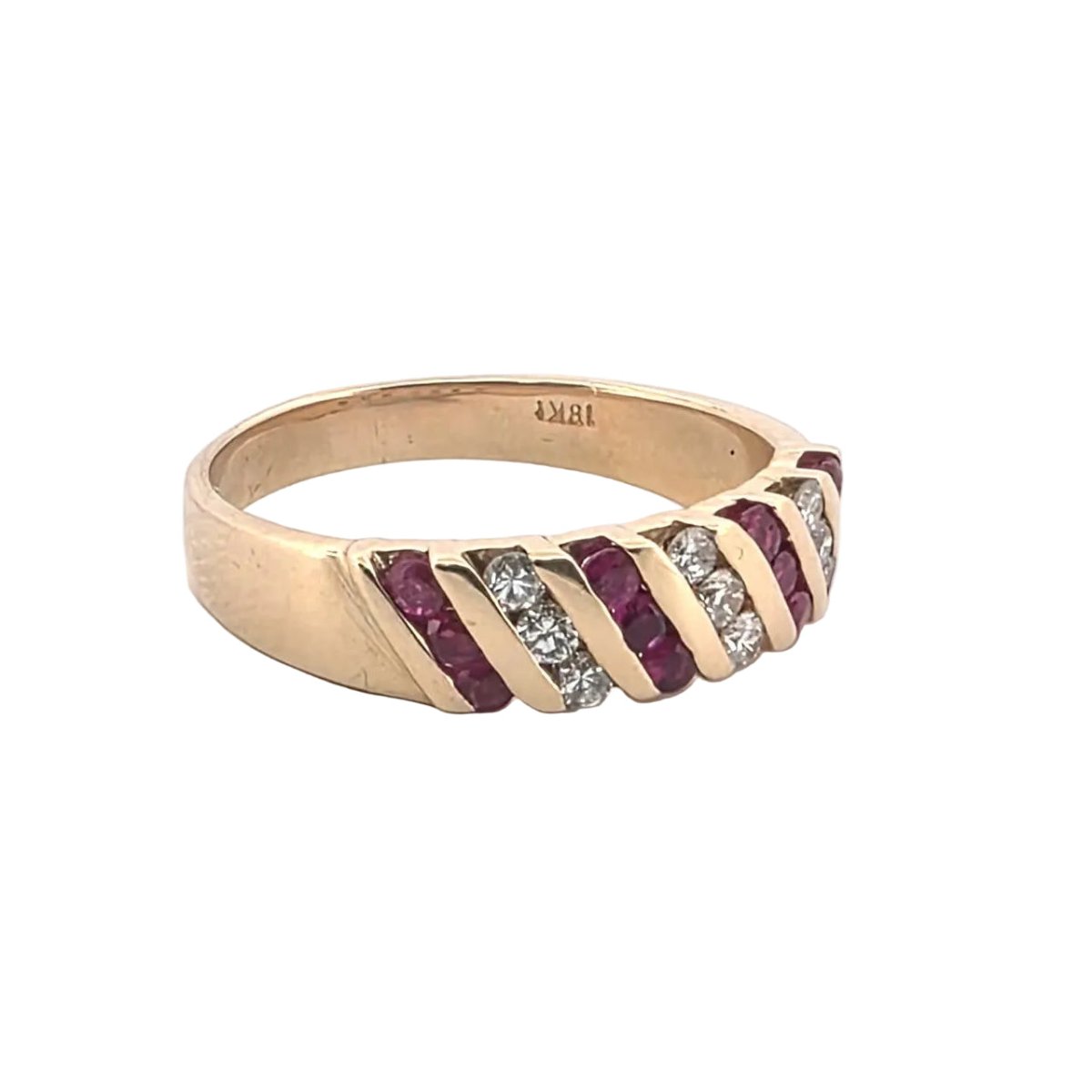 Bague en or jaune, rubis et diamants - Castafiore