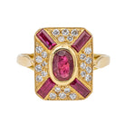 Bague en or jaune, rubis et diamants - Castafiore