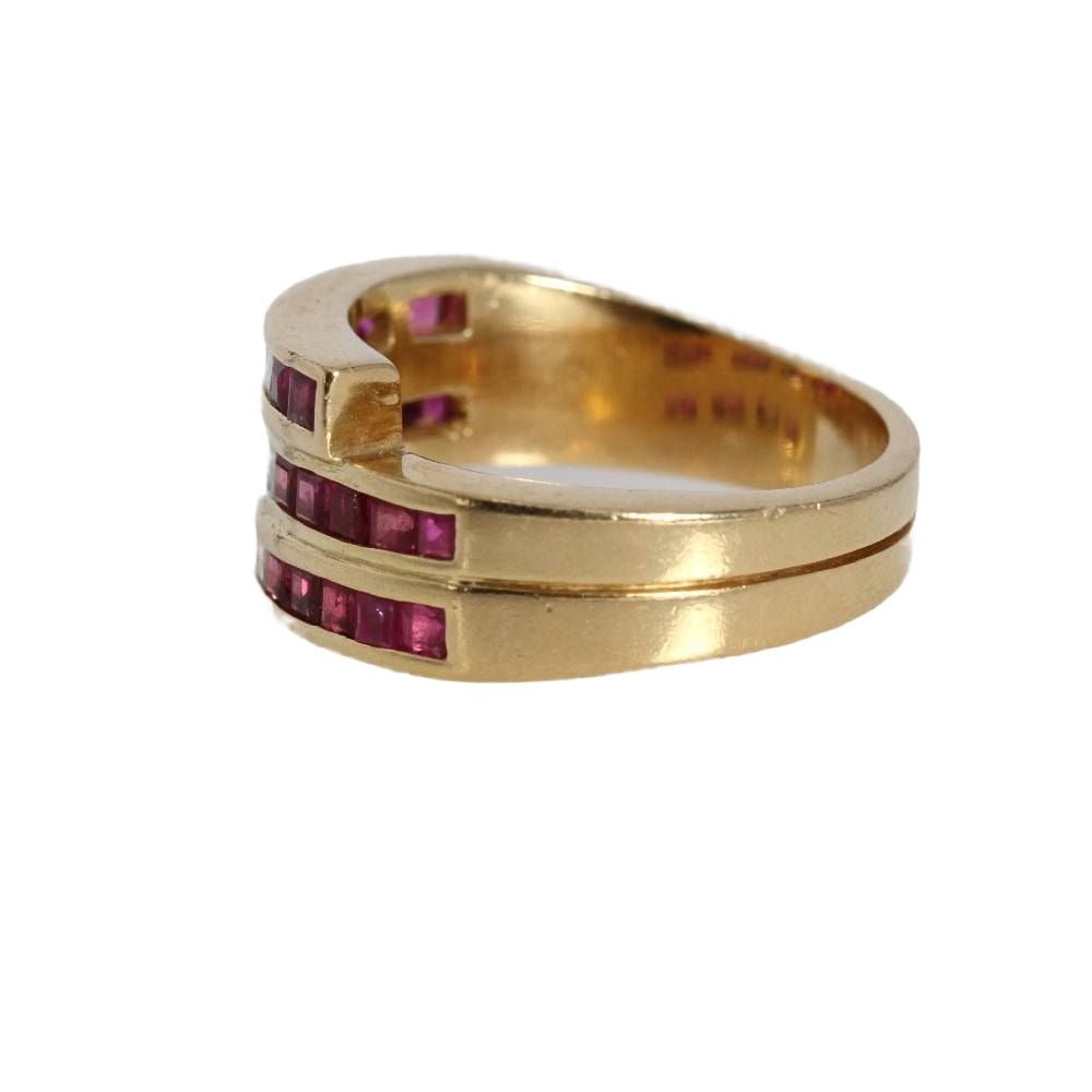 Bague en or jaune, rubis et diamants - Castafiore