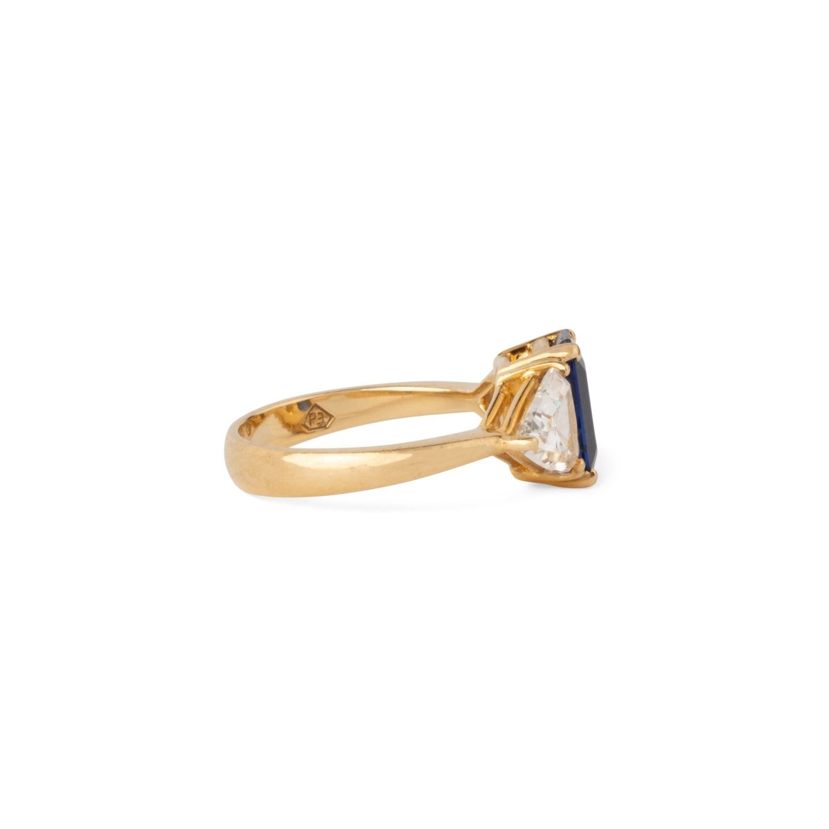 Bague Jarretière en or jaune, saphir et diamants