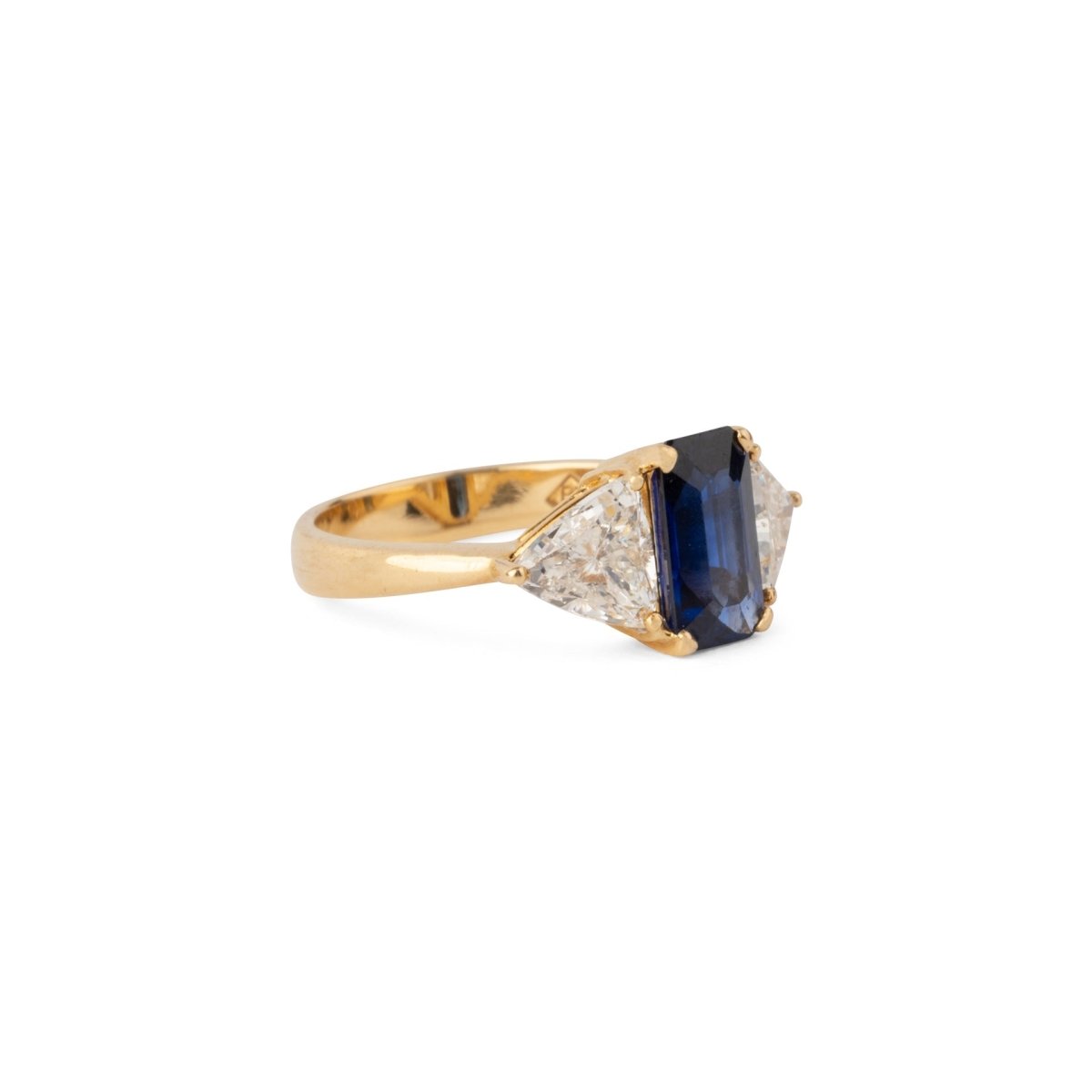 Bague Jarretière en or jaune, saphir et diamants