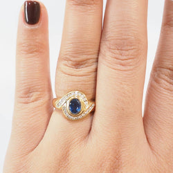 Bague en or jaune, saphir, et diamants - Castafiore