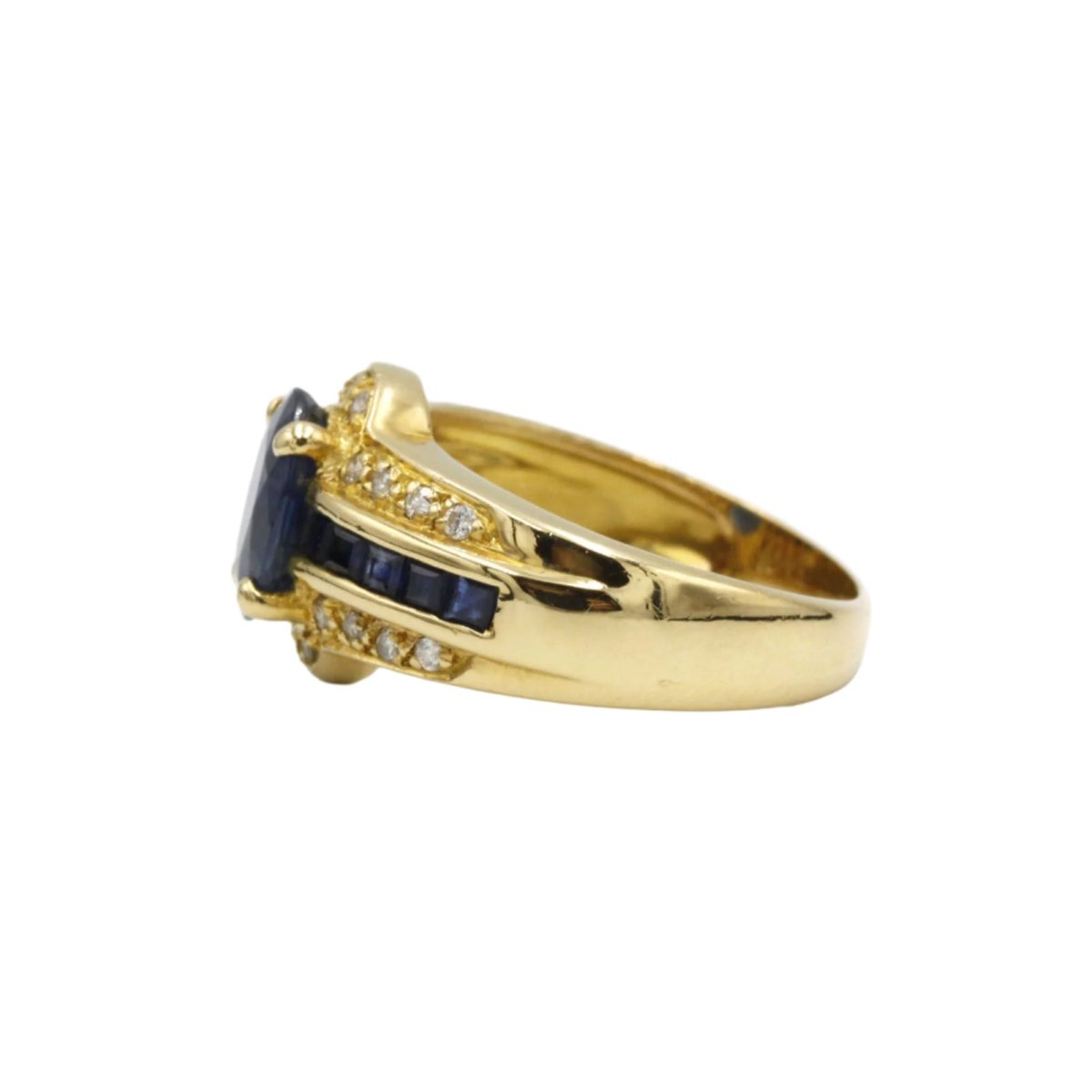 Bague en or jaune, saphirs et diamants - Castafiore