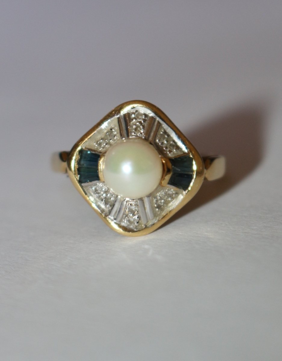 Bague en or jaune, saphirs, et perle - Castafiore