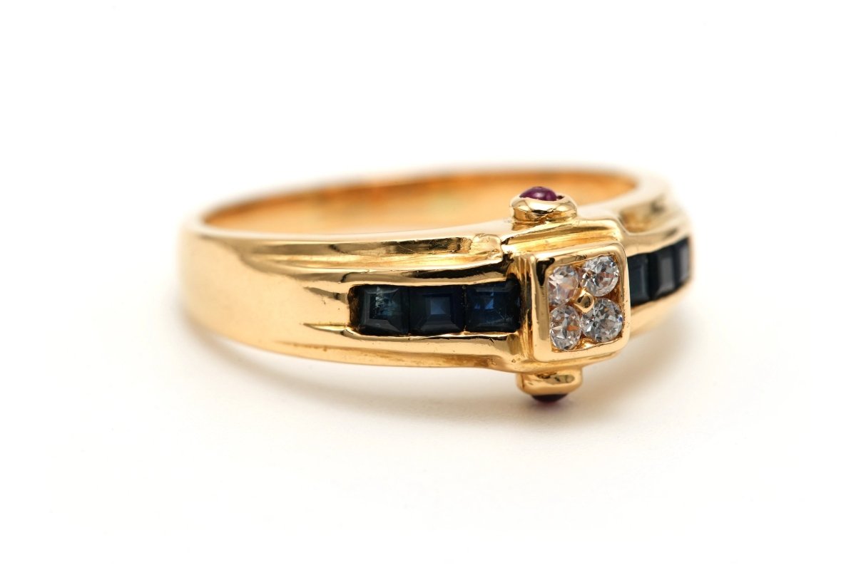 Bague en or jaune, saphirs, rubis et diamants - Castafiore