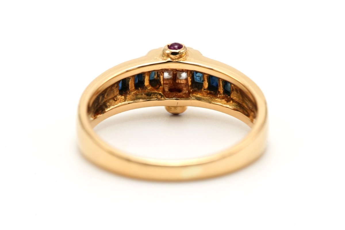 Bague en or jaune, saphirs, rubis et diamants - Castafiore