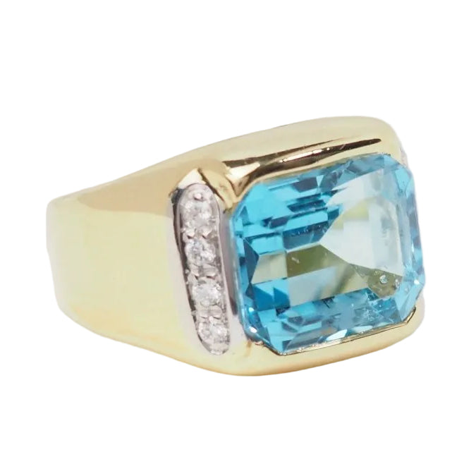 Bague en or jaune, Topaze bleue et diamants - Castafiore