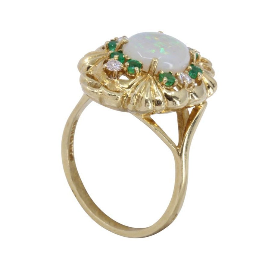 Bague en or, opale, émeraudes et diamants - Castafiore