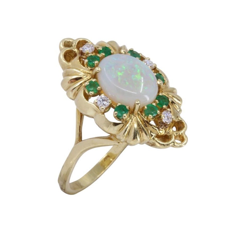 Bague en or, opale, émeraudes et diamants - Castafiore