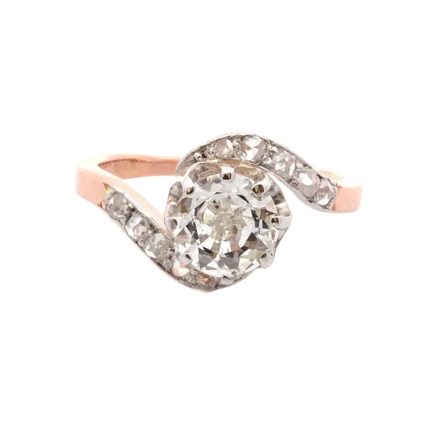 Ring former diamonds in gold and paltinium