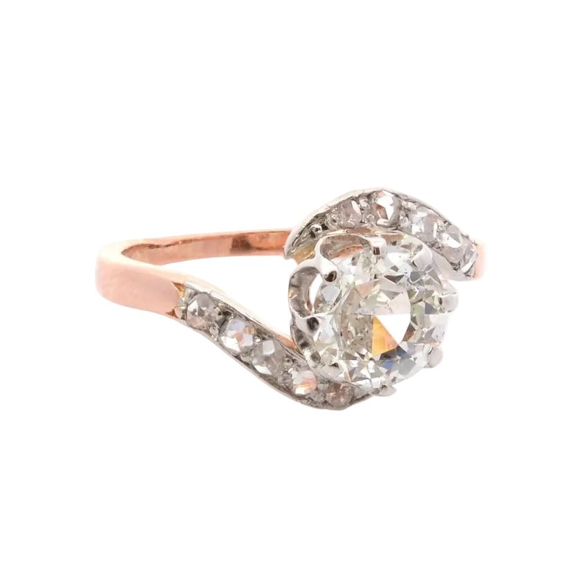 Ring former diamonds in gold and paltinium
