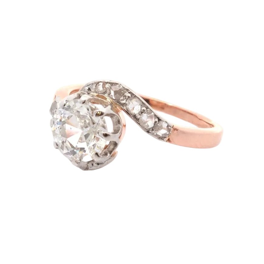 Ring former diamonds in gold and paltinium