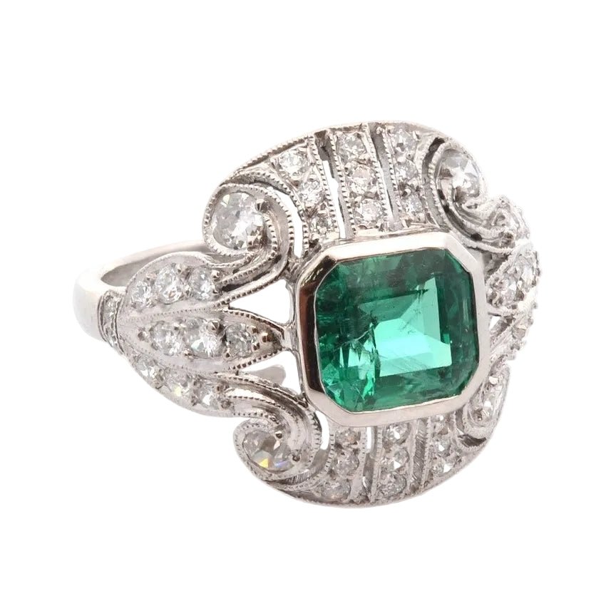 Bague en platine, émeraude et diamants - Castafiore
