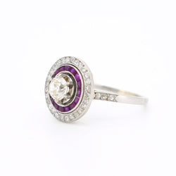 Bague en platine, rubis et diamants - Castafiore