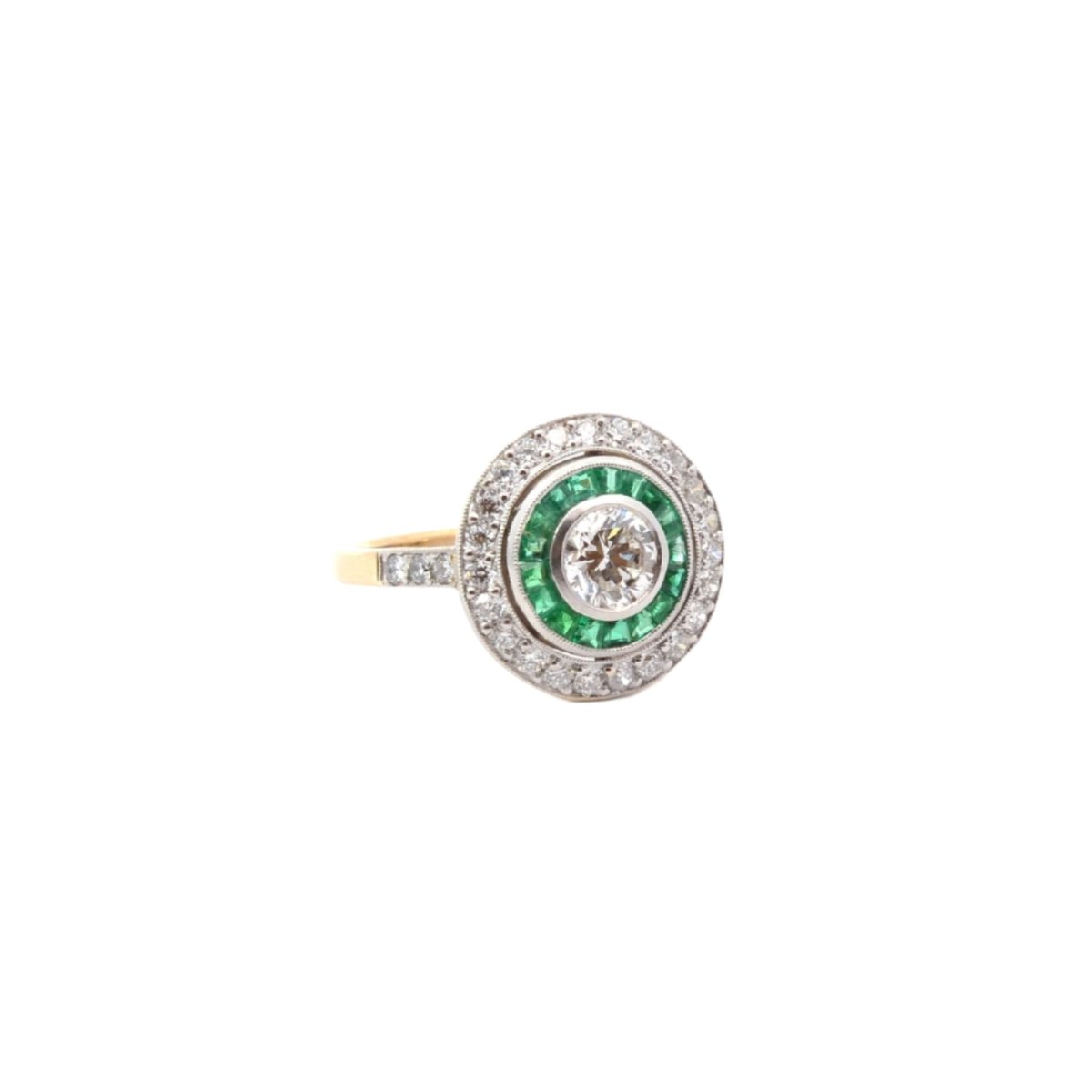 Bague Entourage Art déco en or blanc, platine, émeraudes et diamants - Castafiore