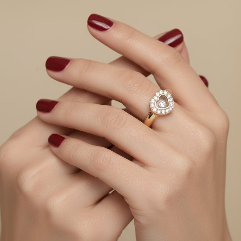 Bague Entourage CHOPARD "Happy Diamond" en or jaune et diamants - Castafiore