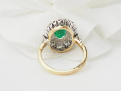 Bague entourage en or bicolore, émeraude et diamants - Castafiore