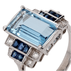 Bague Entourage en or blanc, aigue - marine, saphirs et diamants - Castafiore