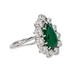 Bague Entourage en or blanc, émeraude et diamants - Castafiore