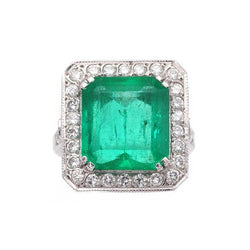 Bague Entourage en or blanc, émeraude et diamants - Castafiore