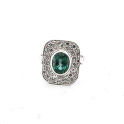 Bague Entourage en or blanc, émeraude et diamants - Castafiore