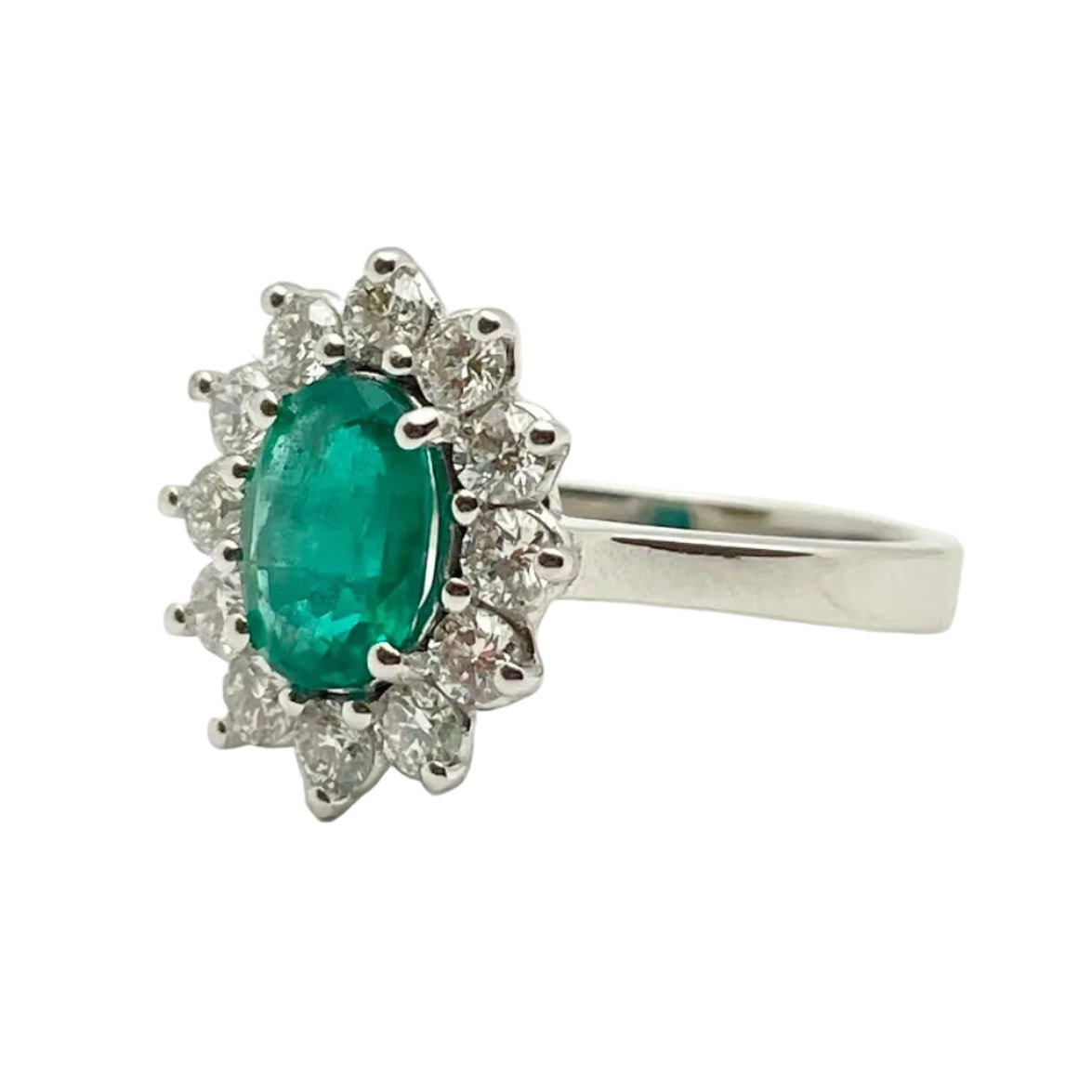Bague Entourage en or blanc, émeraude et diamants - Castafiore