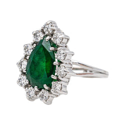 Bague Entourage en or blanc, émeraude et diamants - Castafiore