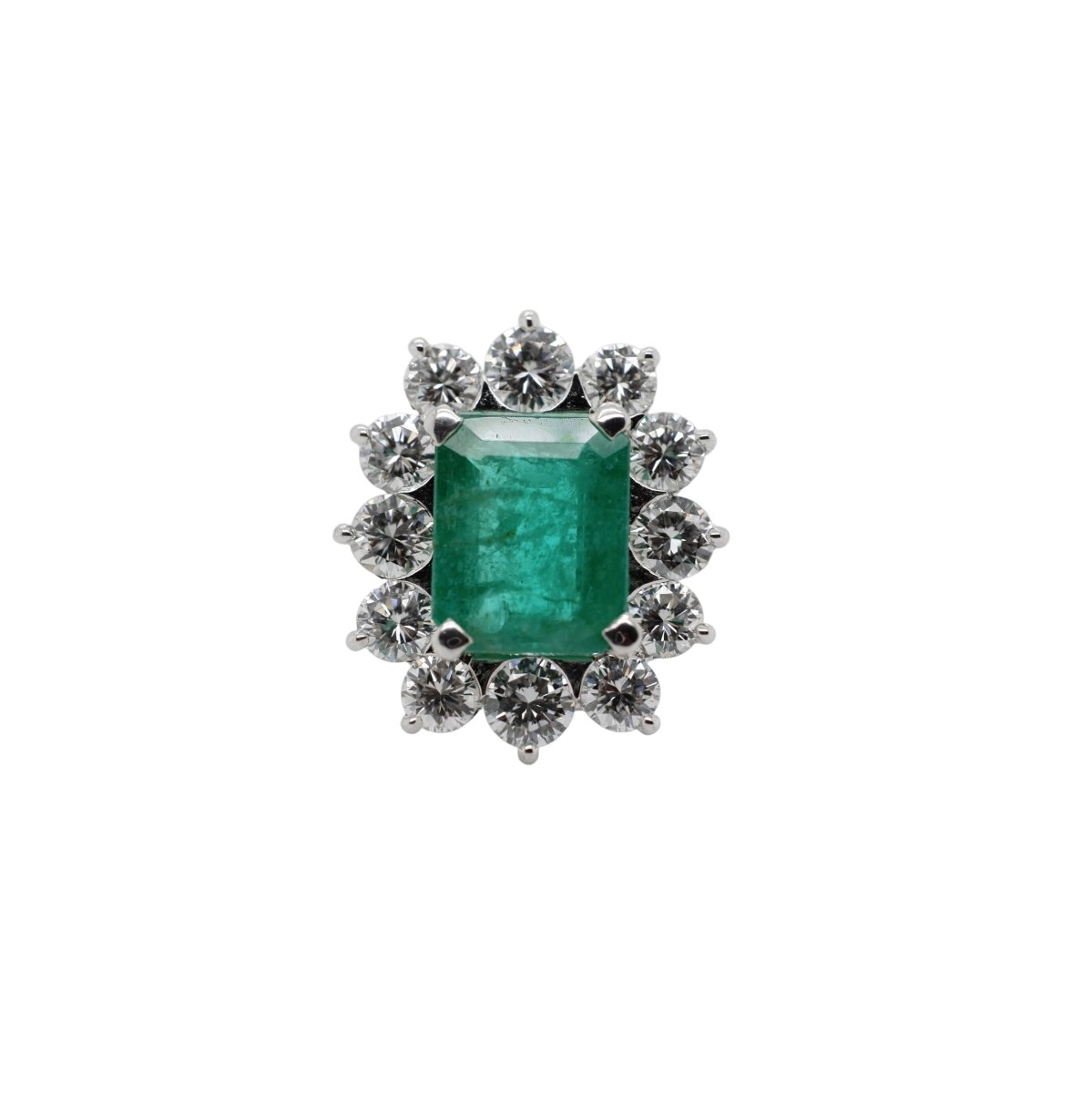 Bague Entourage en or blanc, émeraude et diamants - Castafiore