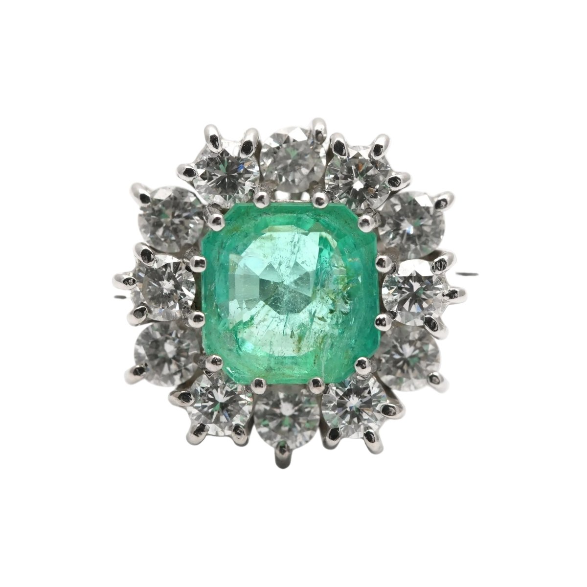 Bague Entourage en or blanc, émeraude et diamants - Castafiore