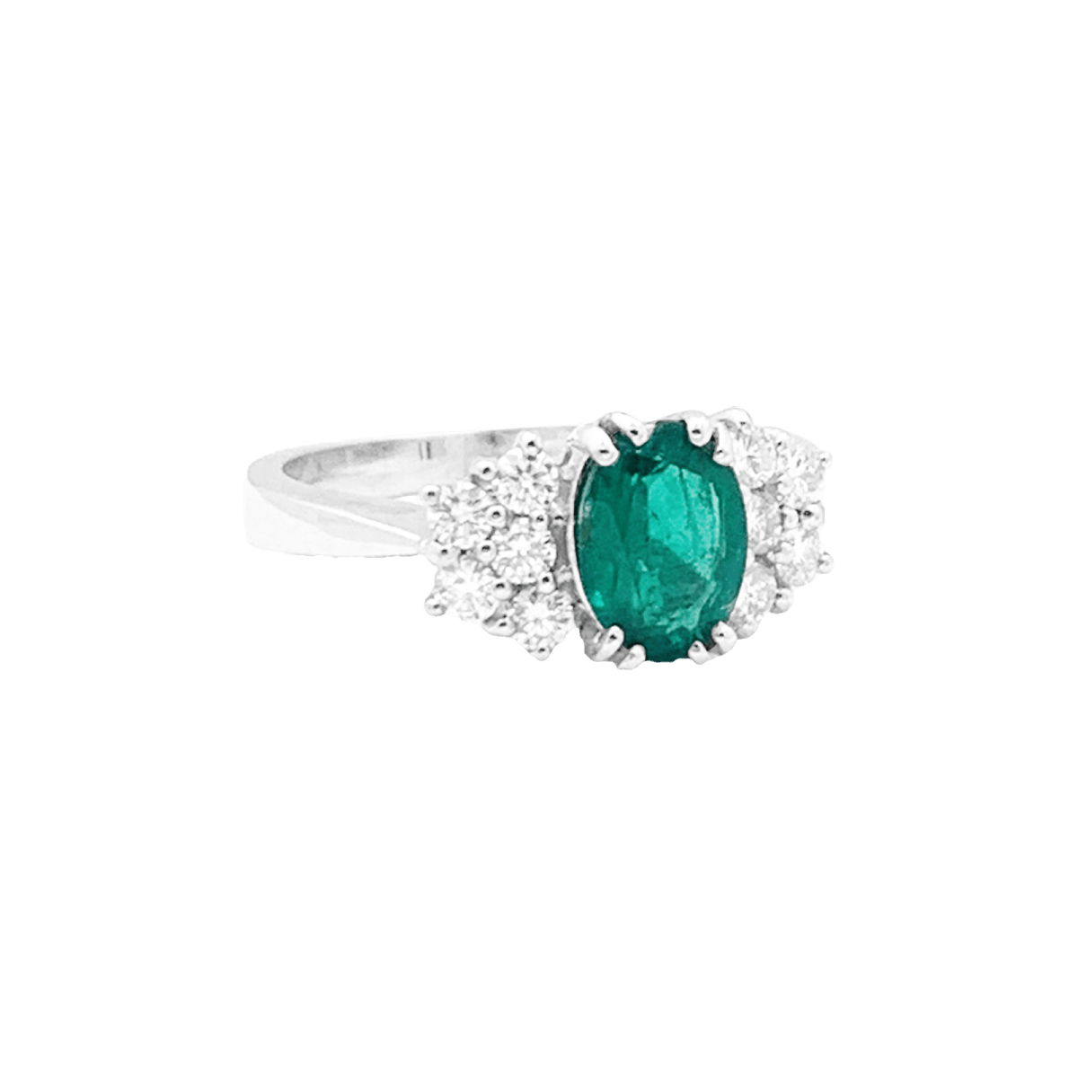 Bague Entourage en or blanc, émeraude et diamants - Castafiore