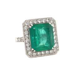 Bague Entourage en or blanc, émeraude et diamants - Castafiore