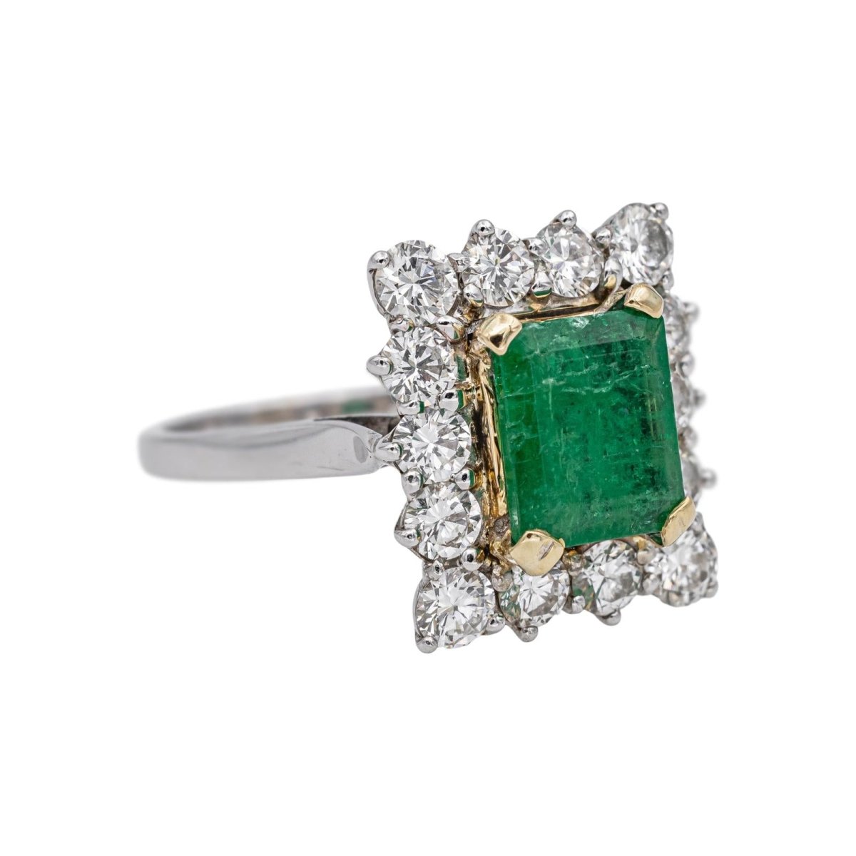 Bague Entourage en or blanc, or jaune, émeraude et diamants - Castafiore