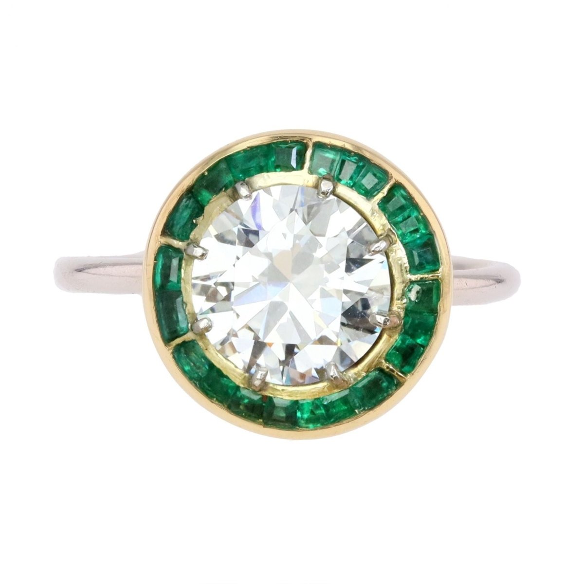 Bague Entourage en or blanc, or jaune, émeraudes et diamants - Castafiore