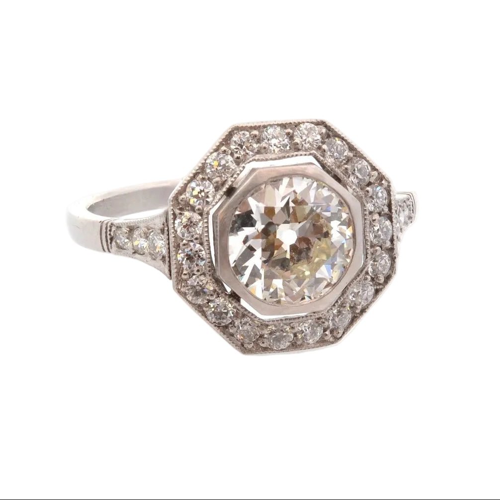 Bague Entourage en or blanc, platine et diamants - Castafiore