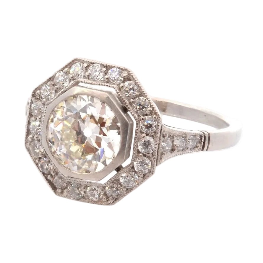 Bague Entourage en or blanc, platine et diamants - Castafiore