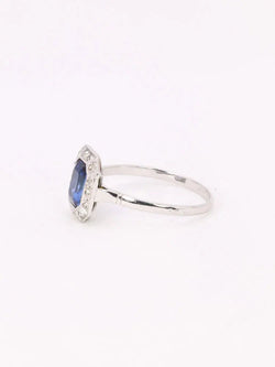 Bague Entourage en or blanc, platine, pierre bleue et diamants - Castafiore