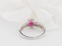 Bague entourage en or blanc, rubis et diamants - Castafiore