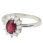 Bague entourage en or blanc, rubis et diamants - Castafiore