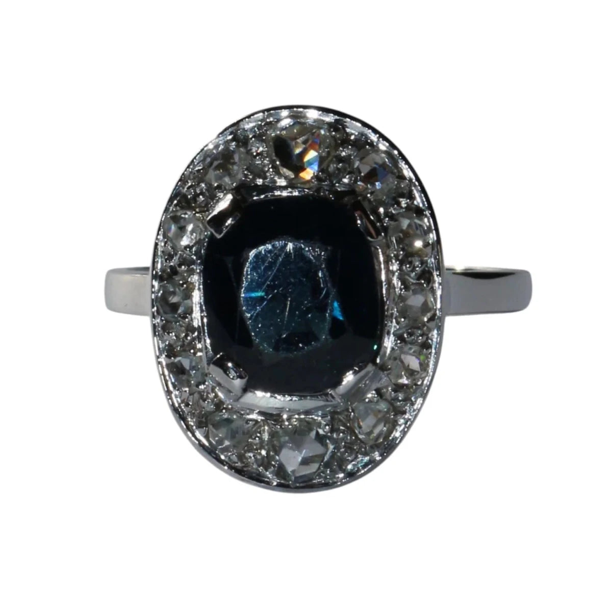 Bague Entourage en or blanc, saphir et diamants - Castafiore